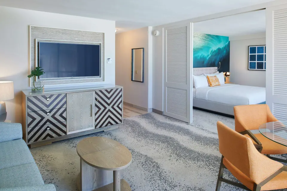 Ocean View Suite living area and bedroom at OUTRIGGER Waikiki Beachcomber Hotel.