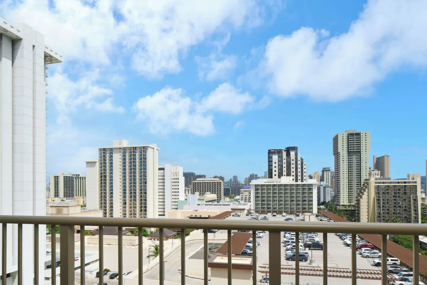 Balcony city view from a guest room at OUTRIGGER Waikiki Paradise Hotel.