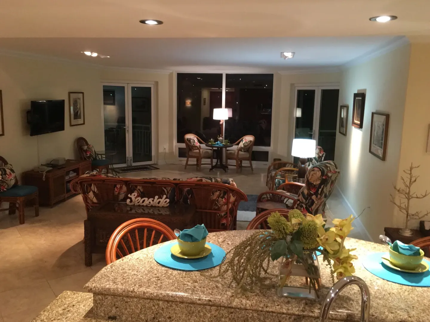 Living room and kitchen counter in a suite at Oyster Bay Beach Resort.