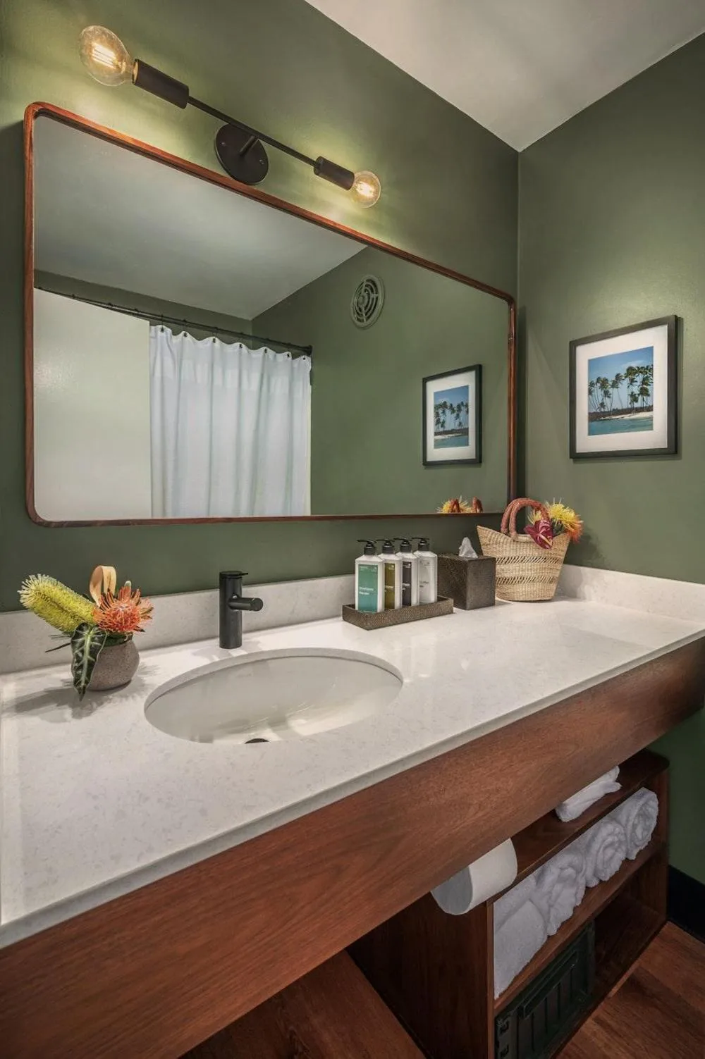 Garden View Two bathroom vanity with mirror and sink at PACIFIC 19 Kona.