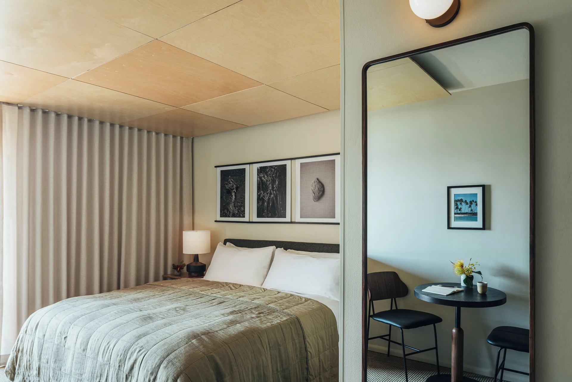 Partial Ocean View Room at PACIFIC 19 Kona with king bed, modern décor, and Pacific Ocean glimpses from a private balcony.