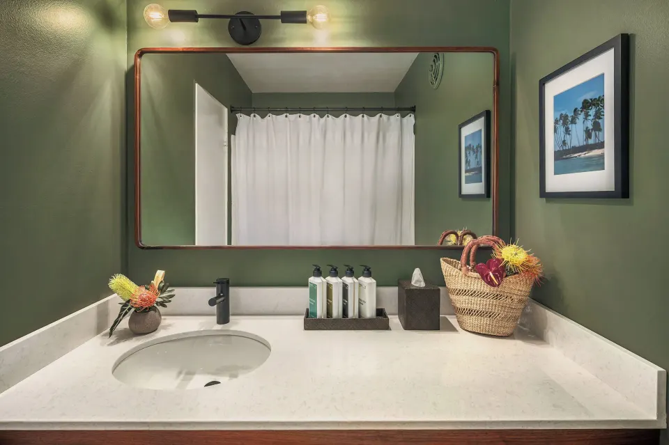 Suite Ohana bathroom vanity with mirror at PACIFIC 19 Kona.