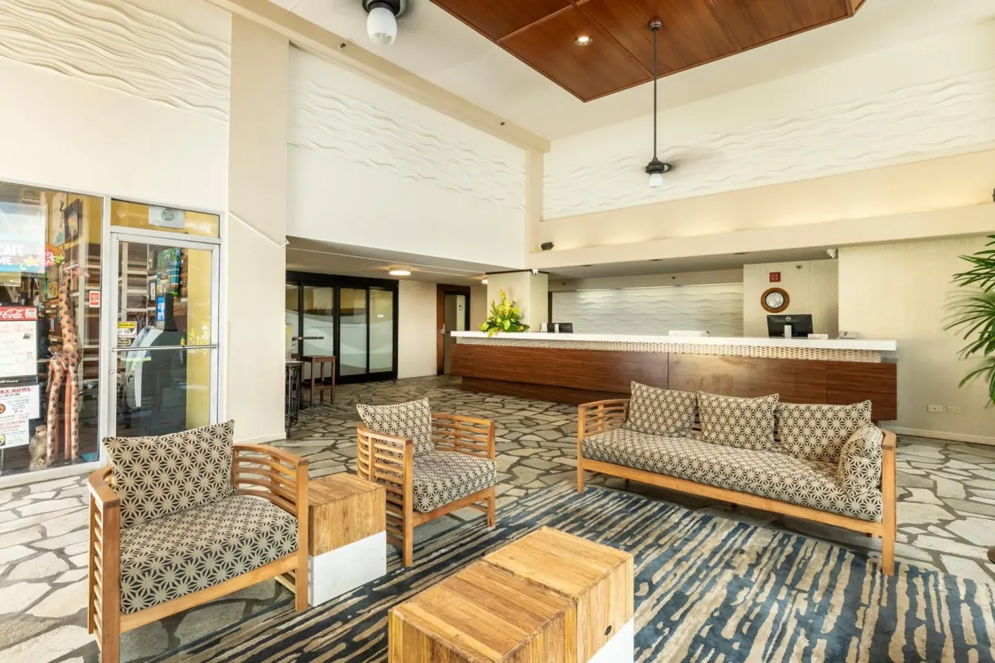 Lobby seating and front desk area at Pacific Monarch Hotel.