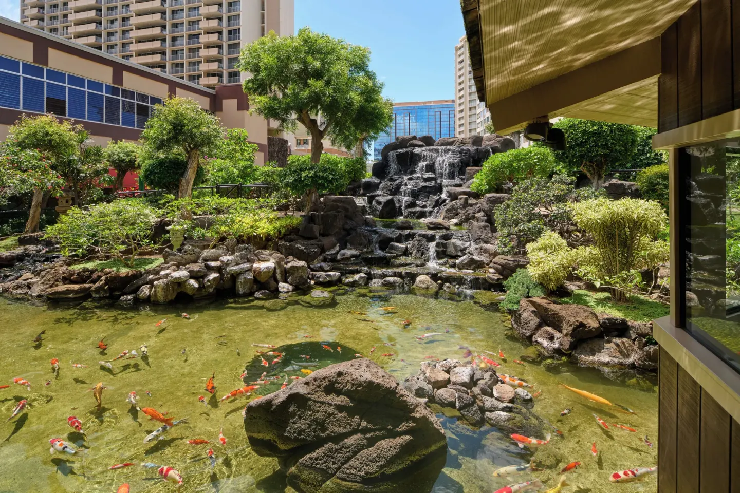Koi pond and waterfall garden beside the restaurant at Pagoda Hotel.