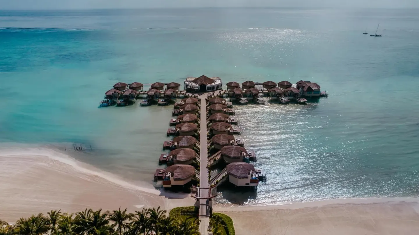 Aerial view of the overwater bungalow pier at Palafitos Overwater Bungalows.