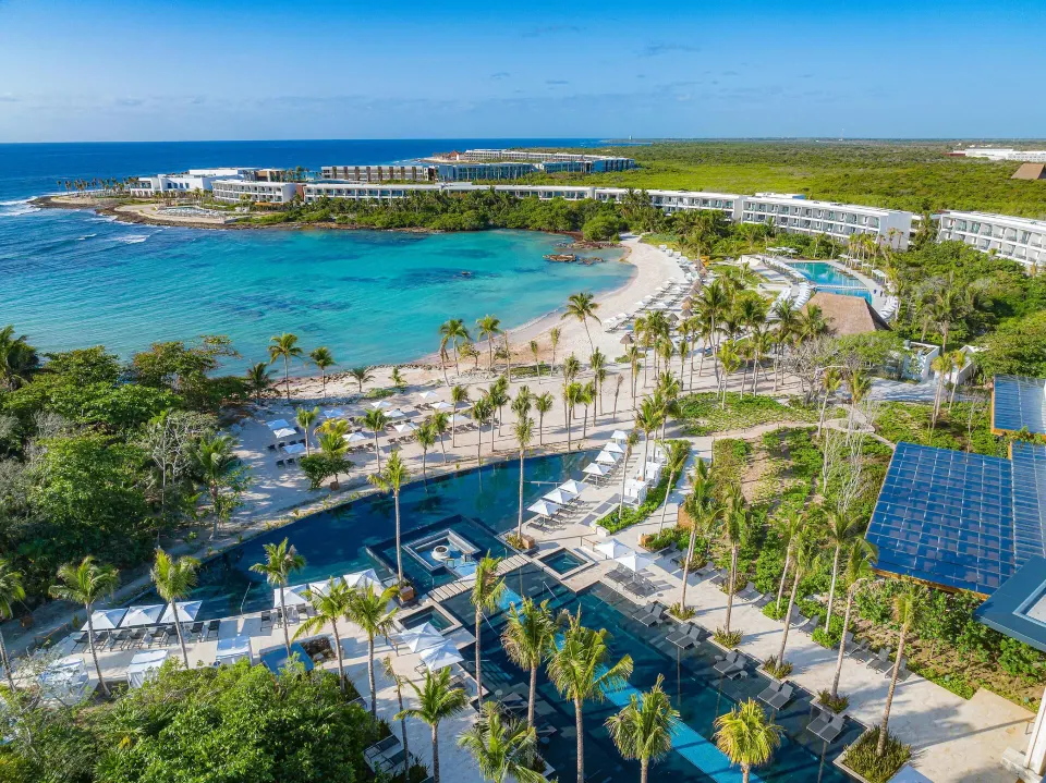 Conrad Tulum Riviera Maya five-star beachfront luxury resort with modern pools and Caribbean coastline in Riviera Maya, Mexico.