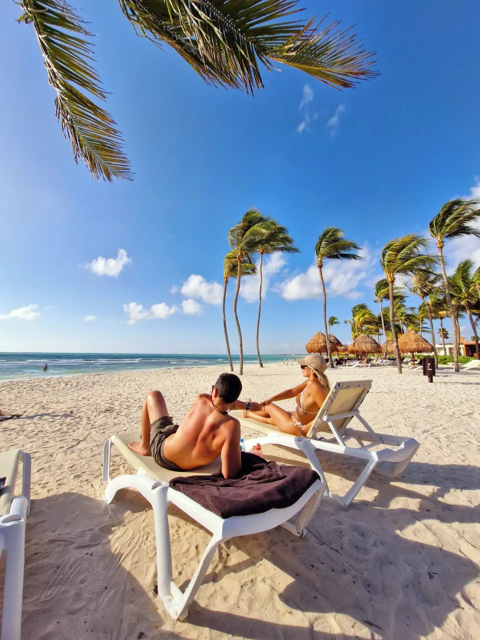 Dreams Tulum Resort & Spa family-friendly all-inclusive beachfront resort with large pool and palm-lined grounds in Tulum, Mexico.