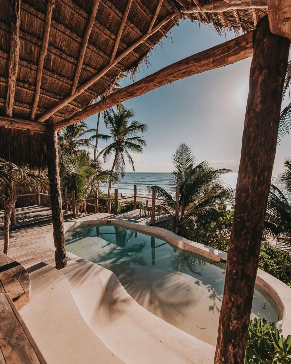 Private plunge pool and ocean view from Casa Coco deck at Papaya Playa Project.