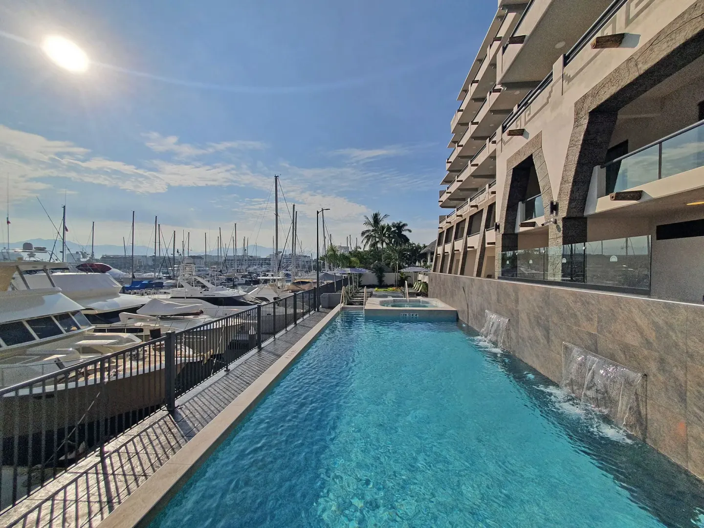 Marina-side pool with water features at Paradise Village Beach Resort and Spa.