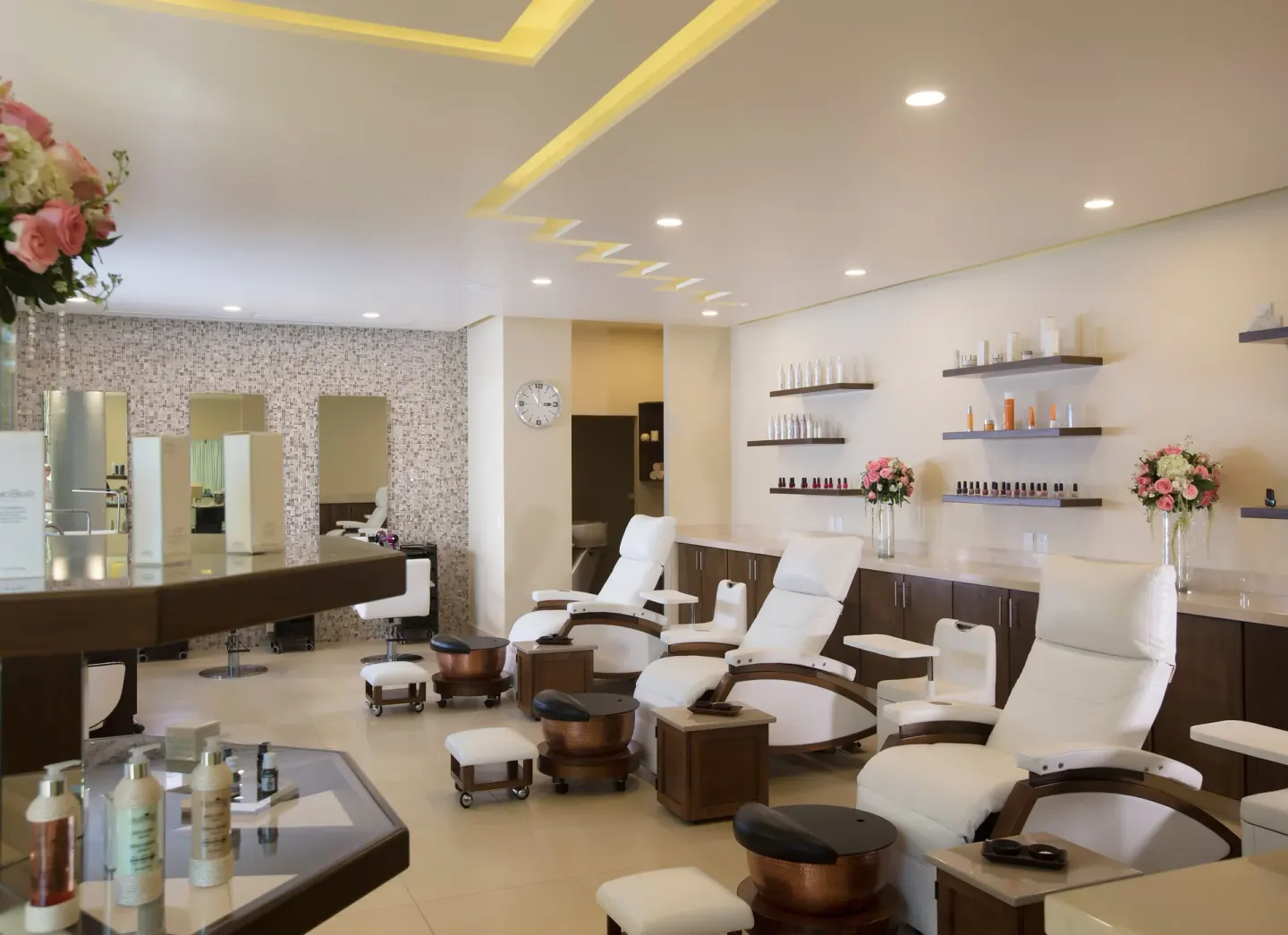 Salon pedicure chairs and nail stations at Paradise Village Beach Resort and Spa.