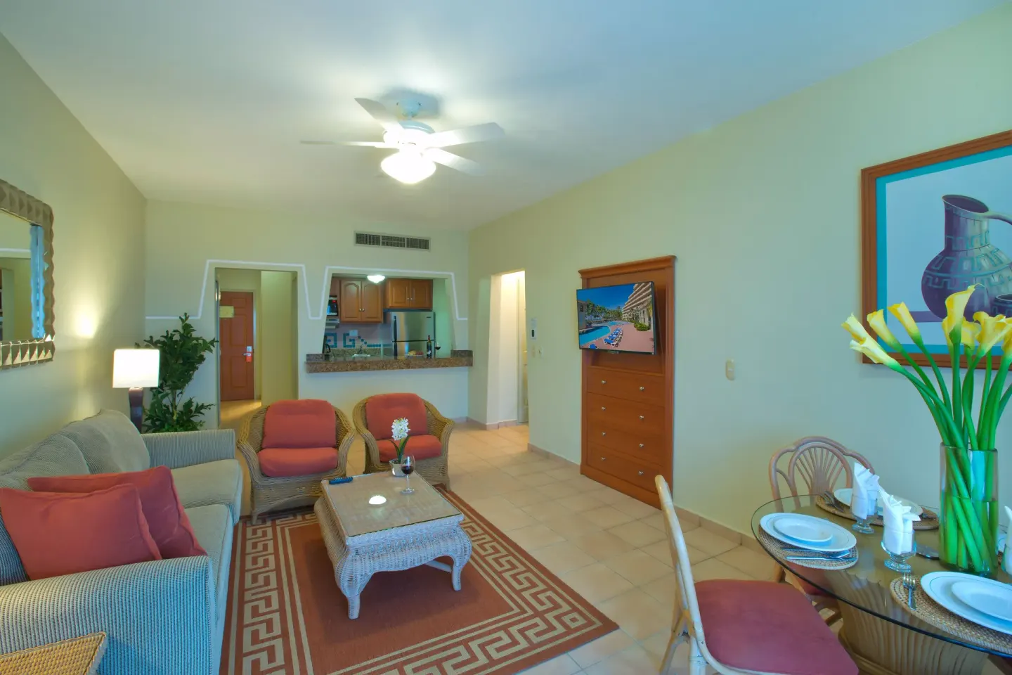 Standard Suite living and dining area at Paradise Village Beach Resort and Spa.