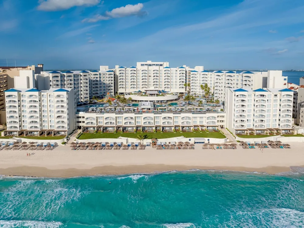 Hilton Cancun Mar Caribe All-Inclusive Resort beachfront hotel with family-friendly amenities and pools