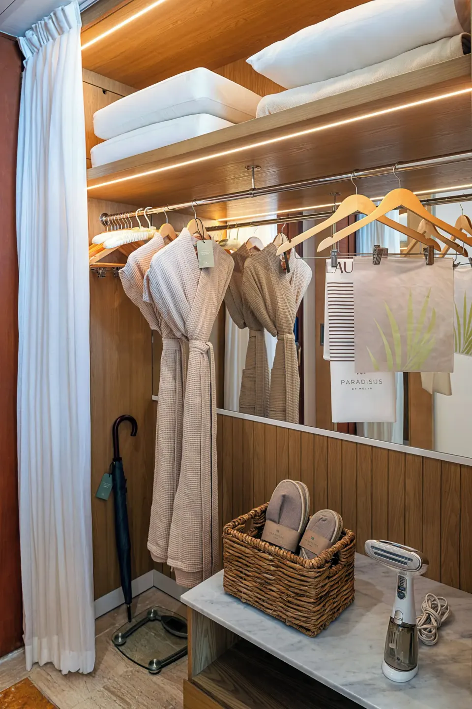 Junior Suite closet with robes, slippers and storage at Paradisus Cancún.