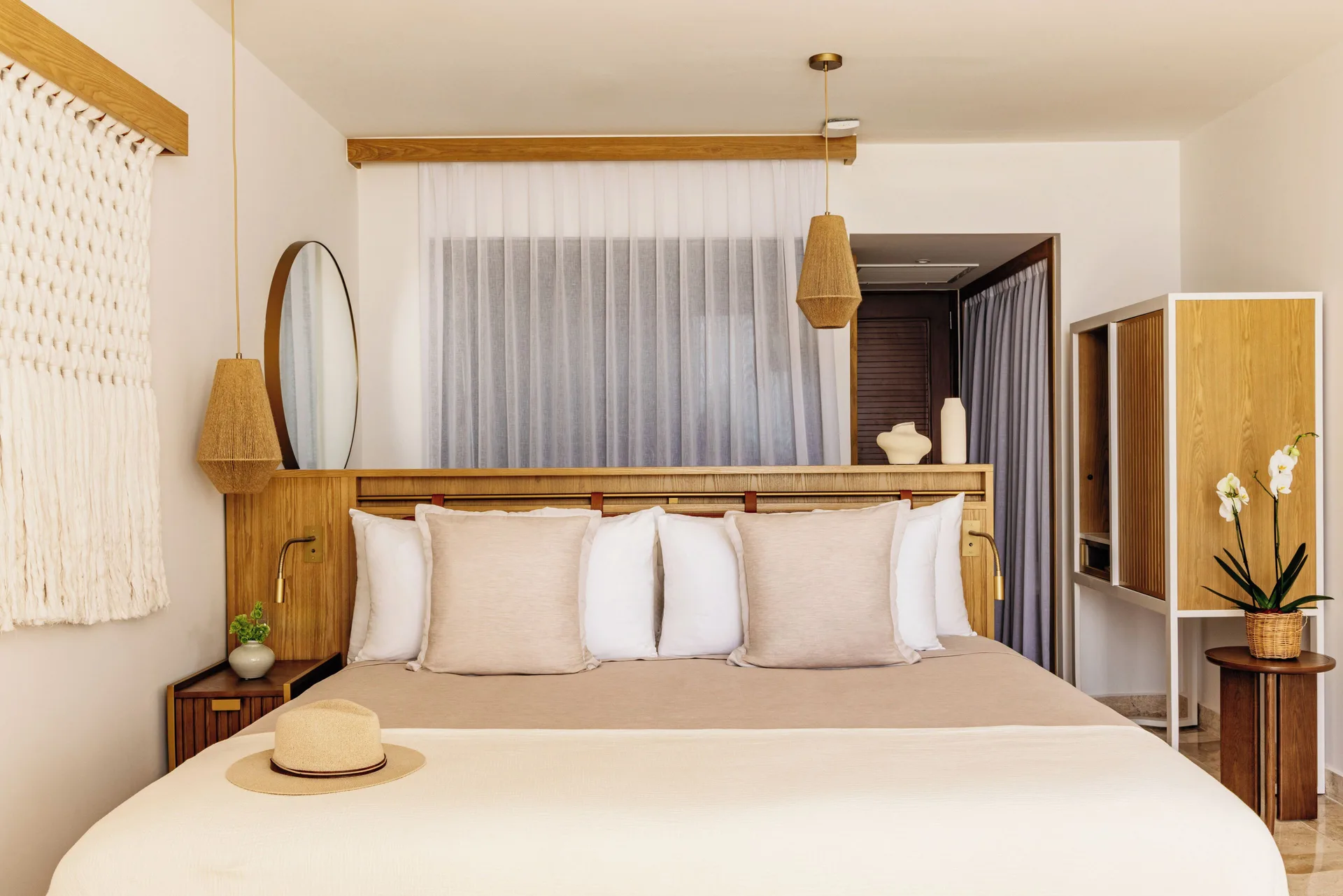 The Reserve Adults Only Junior Suite ocean view bedroom with king bed at Paradisus Cancún.