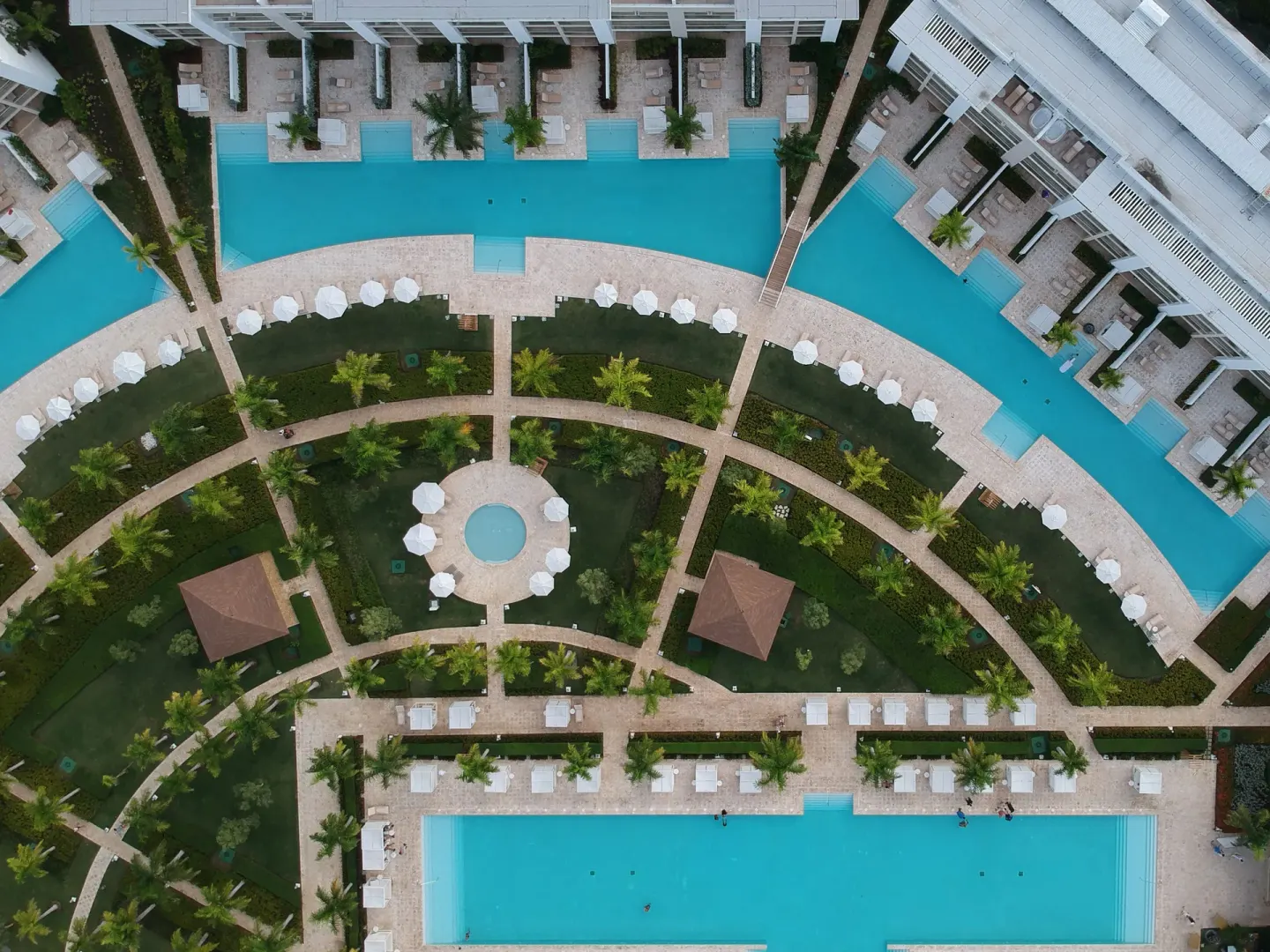 Aerial view of curved paths, pools, and garden landscaping at Paradisus Grand Cana.