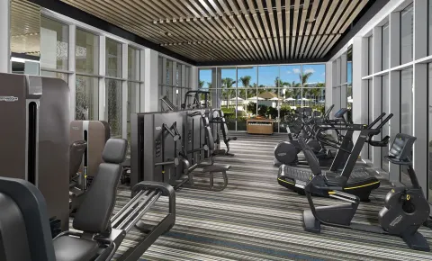 Fitness center with cardio and strength equipment at Paradisus Grand Cana.