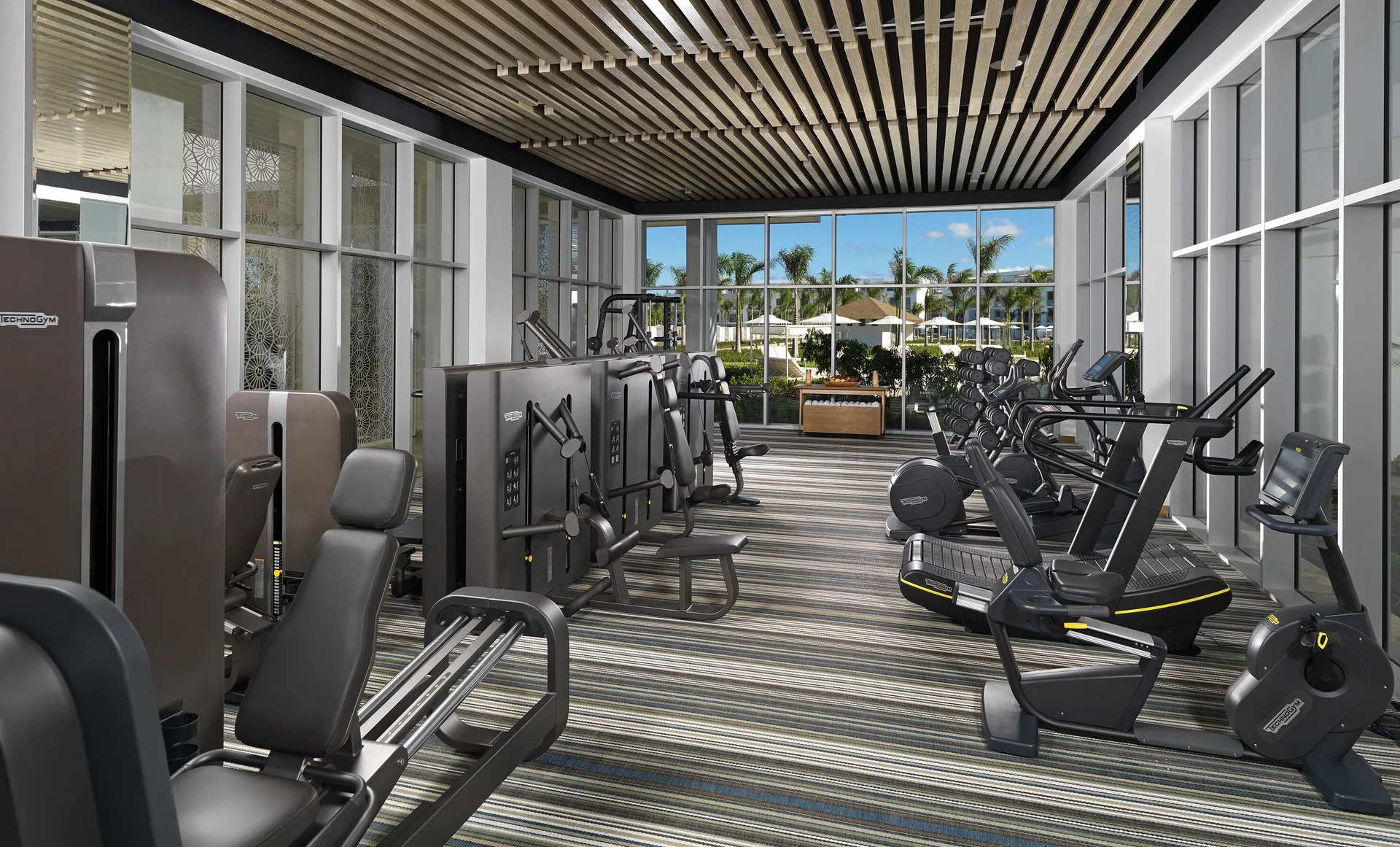 Fitness center with cardio and strength equipment at Paradisus Grand Cana.