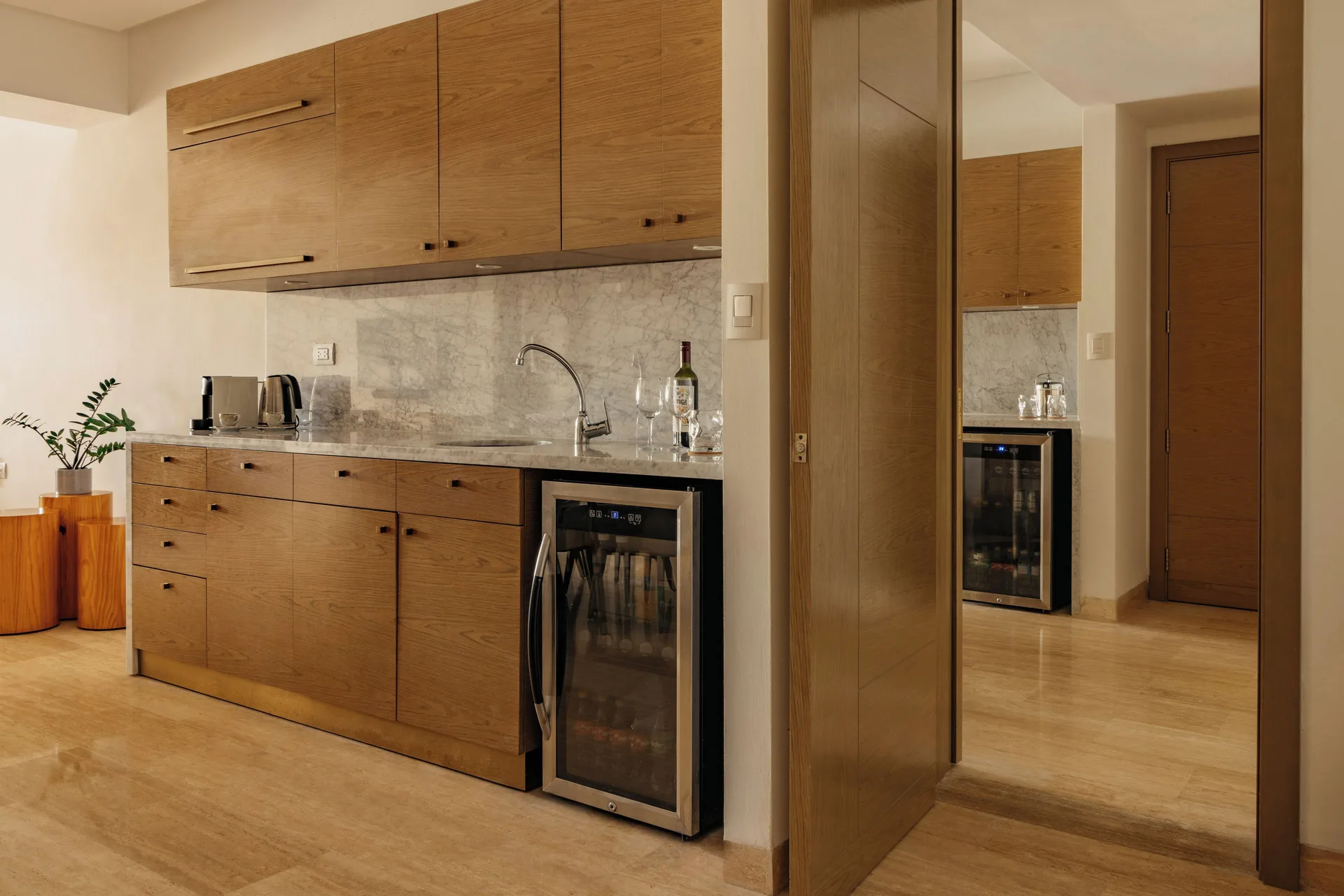 Family Concierge Master Suite kitchenette with sink and beverage fridge at Paradisus Grand Cana.