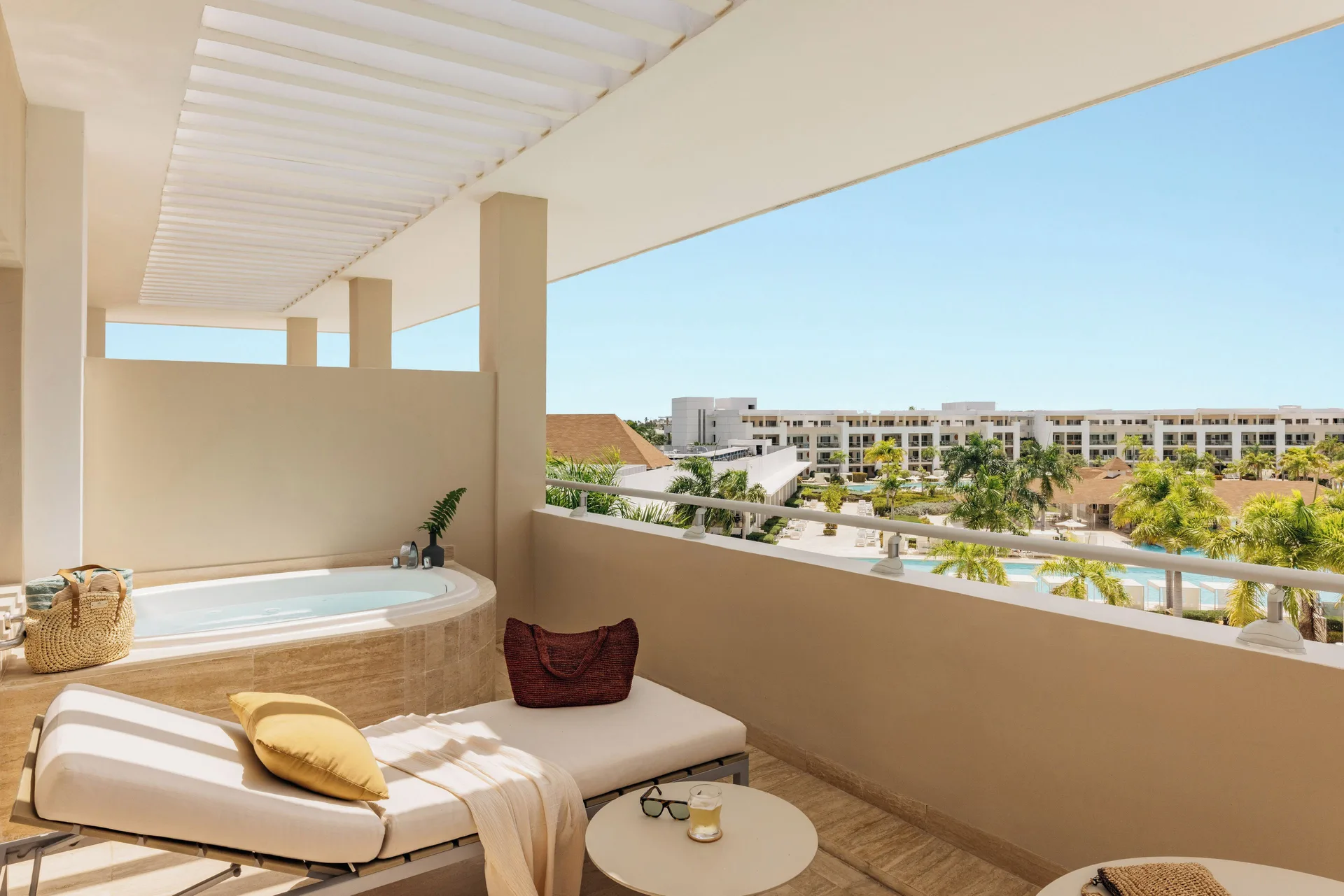Family Concierge Master Suite terrace with lounger and whirlpool tub at Paradisus Grand Cana.