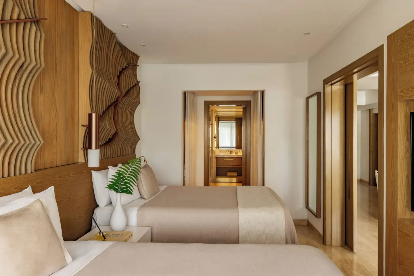 Two beds in the Family Concierge Master Suite bedroom at Paradisus Grand Cana.