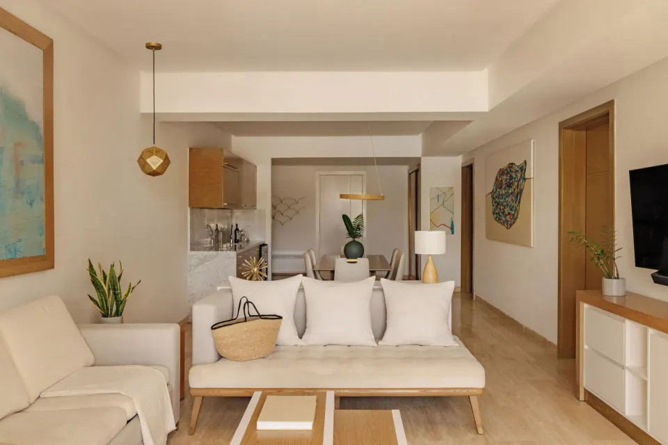 Living and dining area of a Family Concierge suite at Paradisus Grand Cana.