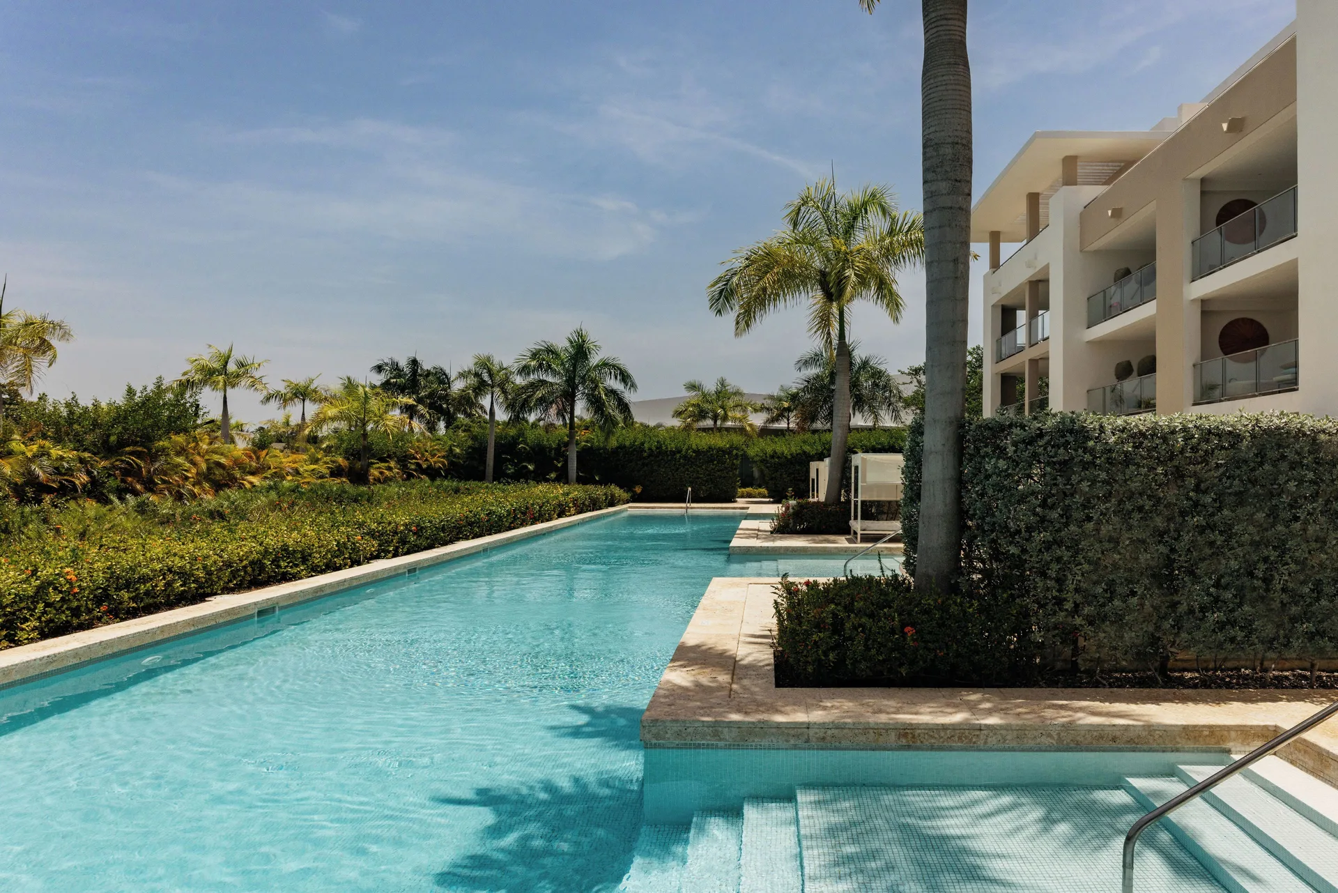 Swim-up pool beside Family Concierge suite patios at Paradisus Grand Cana.