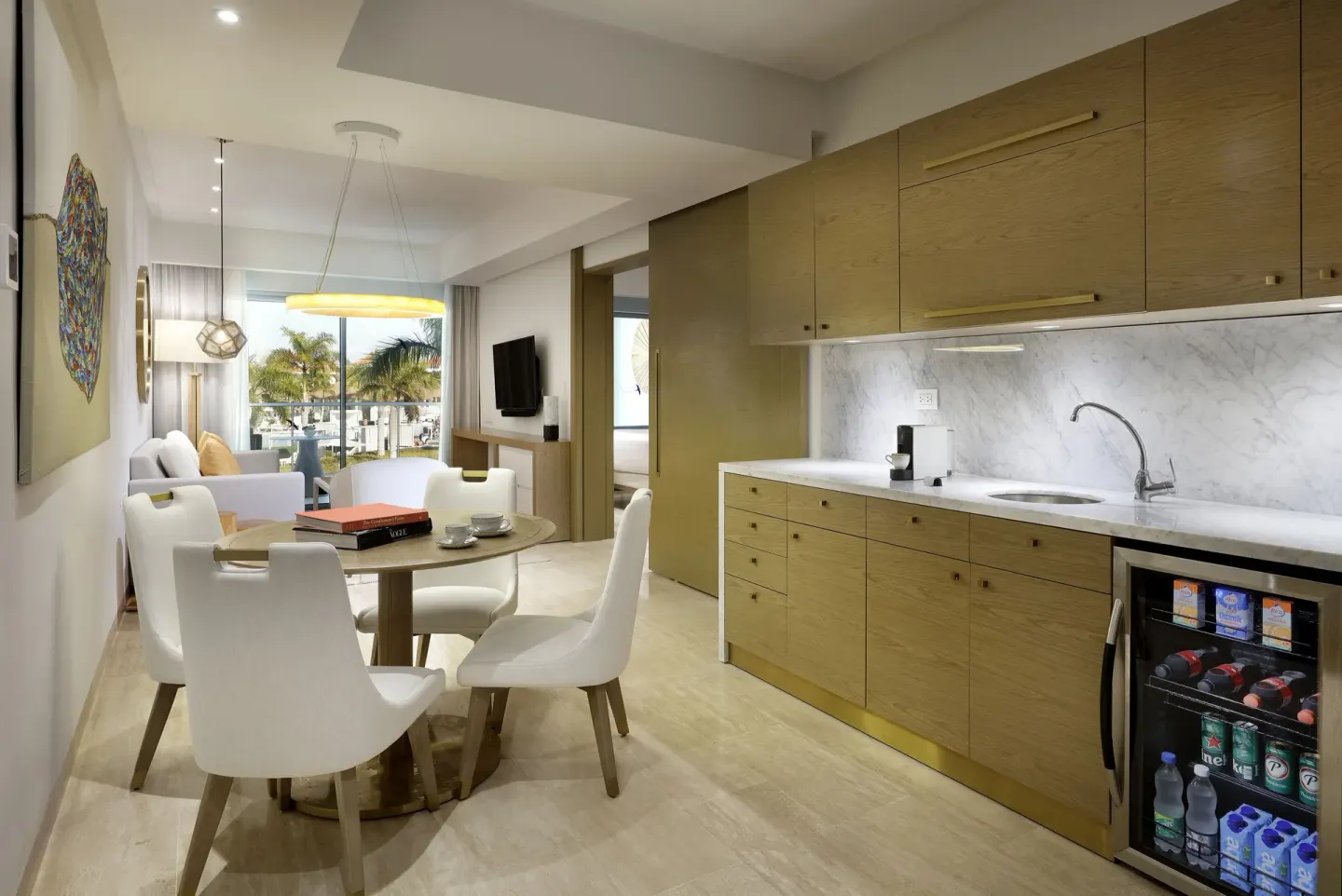 One Bedroom Suite kitchenette and dining area at Paradisus Grand Cana.