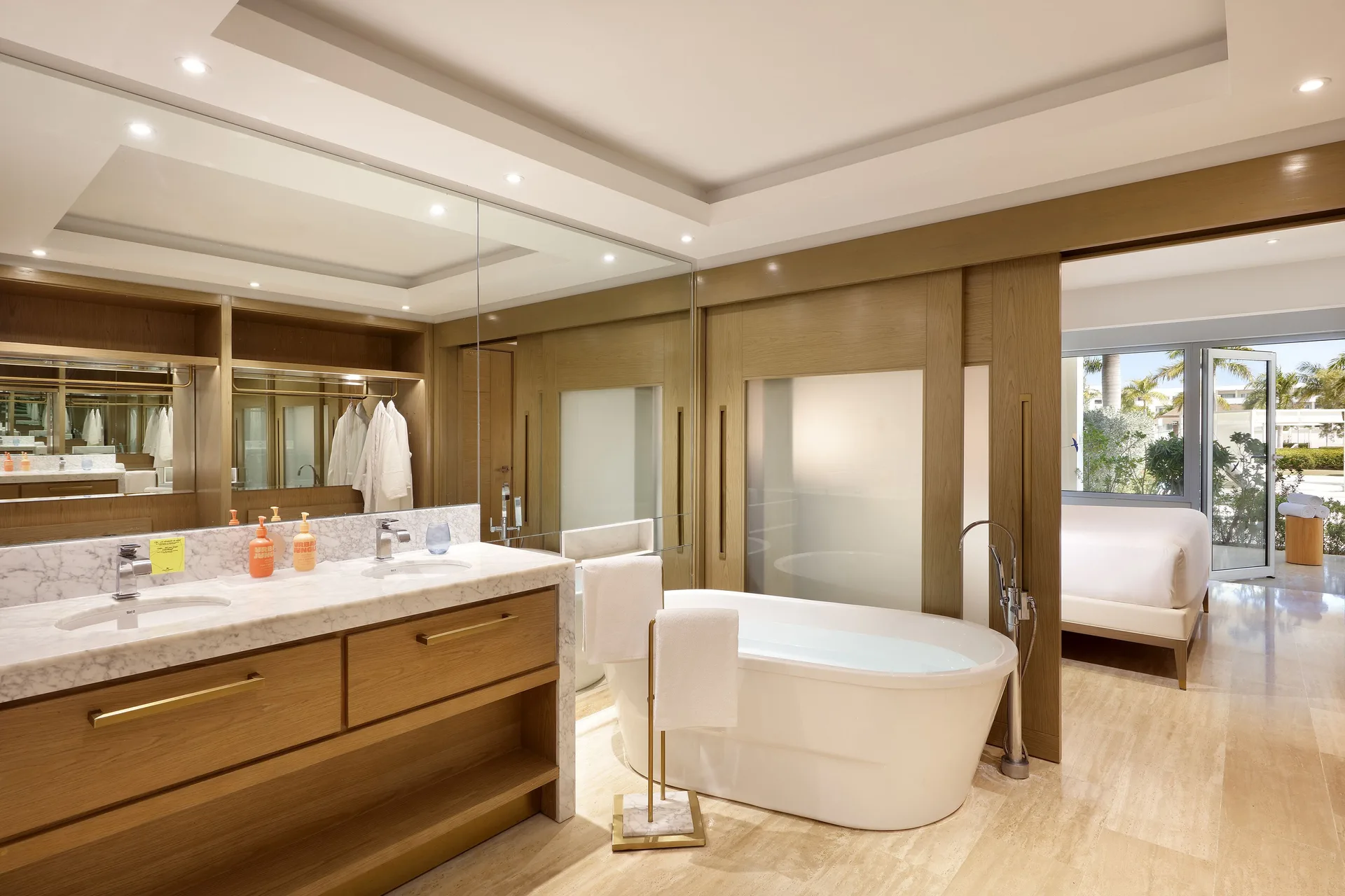 Beyond Swim Up Suite bathroom at Paradisus Grand Cana with double vanity and king bedroom visible in background.