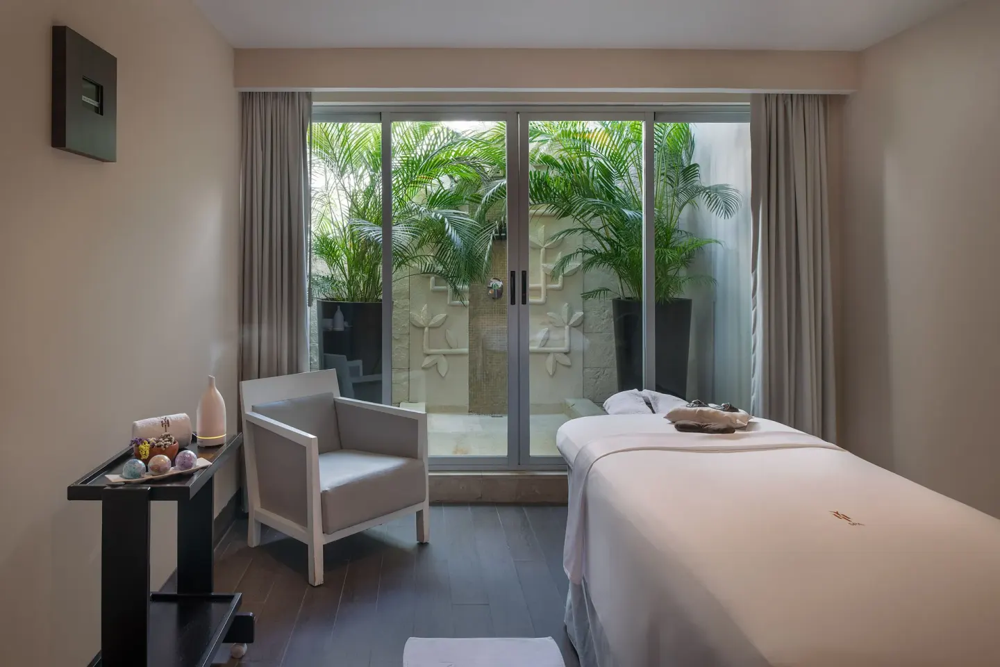 Single spa treatment room with garden patio at Paradisus La Perla Riviera Maya.