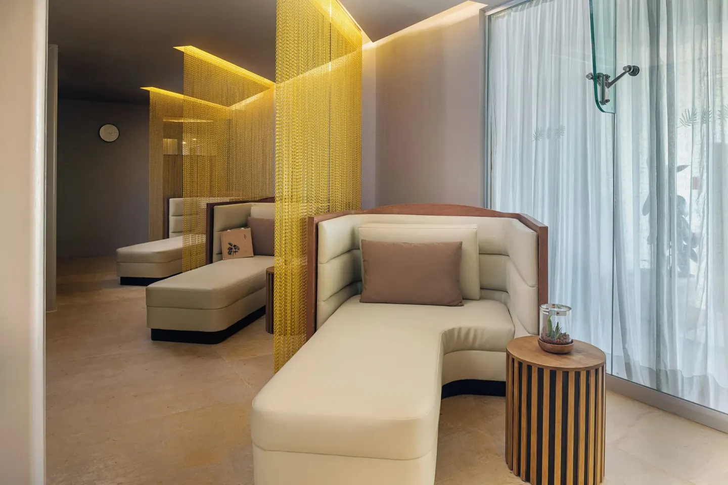 Spa relaxation room with chaise lounges at Paradisus Los Cabos.