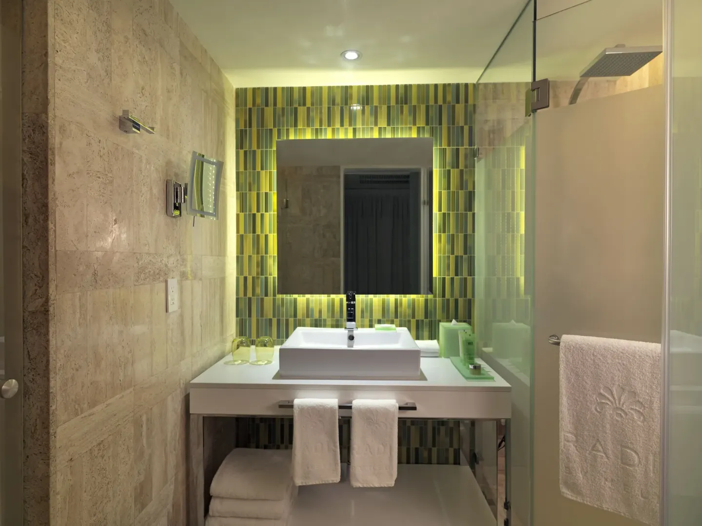 Junior Suite bathroom vanity and glass shower at Paradisus Los Cabos.