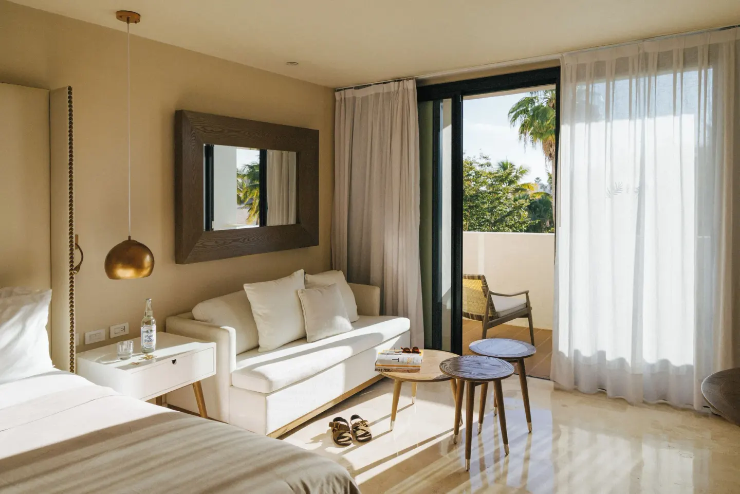 Junior Suite Ocean View sitting area and balcony at Paradisus Los Cabos.
