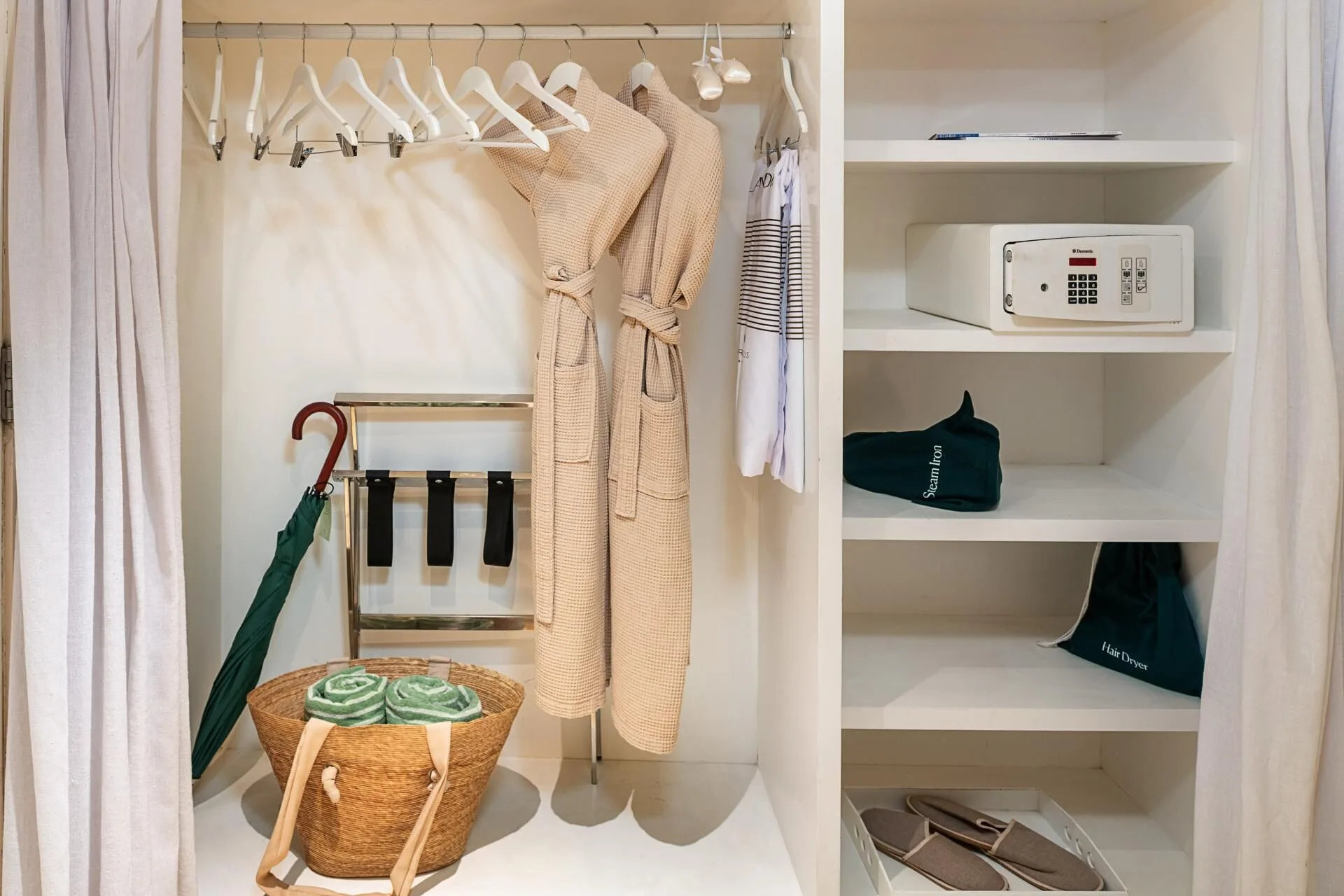 Reserve Suite Ocean Front Swim Up closet with robes and safe at Paradisus Los Cabos.