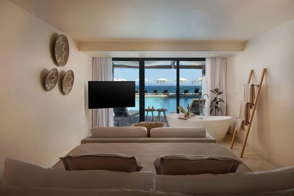 The Reserve Suite Ocean Front Swim Up bedroom facing the ocean at Paradisus Los Cabos.