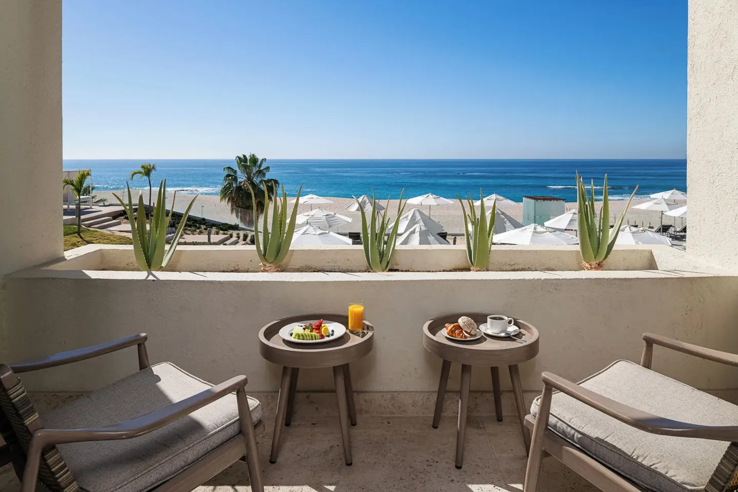 The Reserve Suite Ocean Front terrace with breakfast and ocean view at Paradisus Los Cabos.