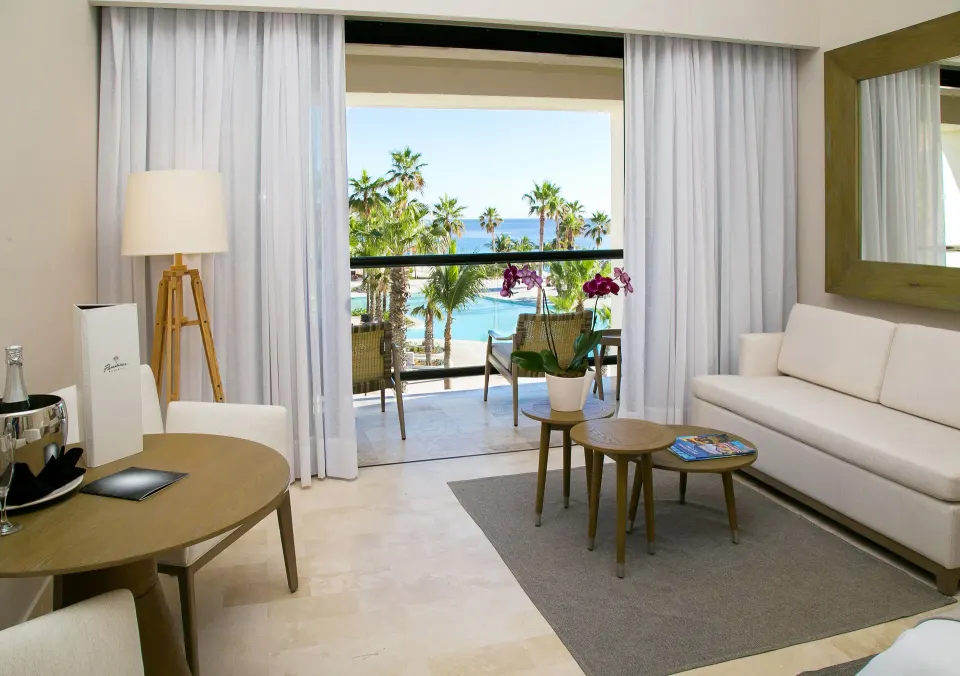 The Reserve Suite Ocean View sitting area and balcony at Paradisus Los Cabos.