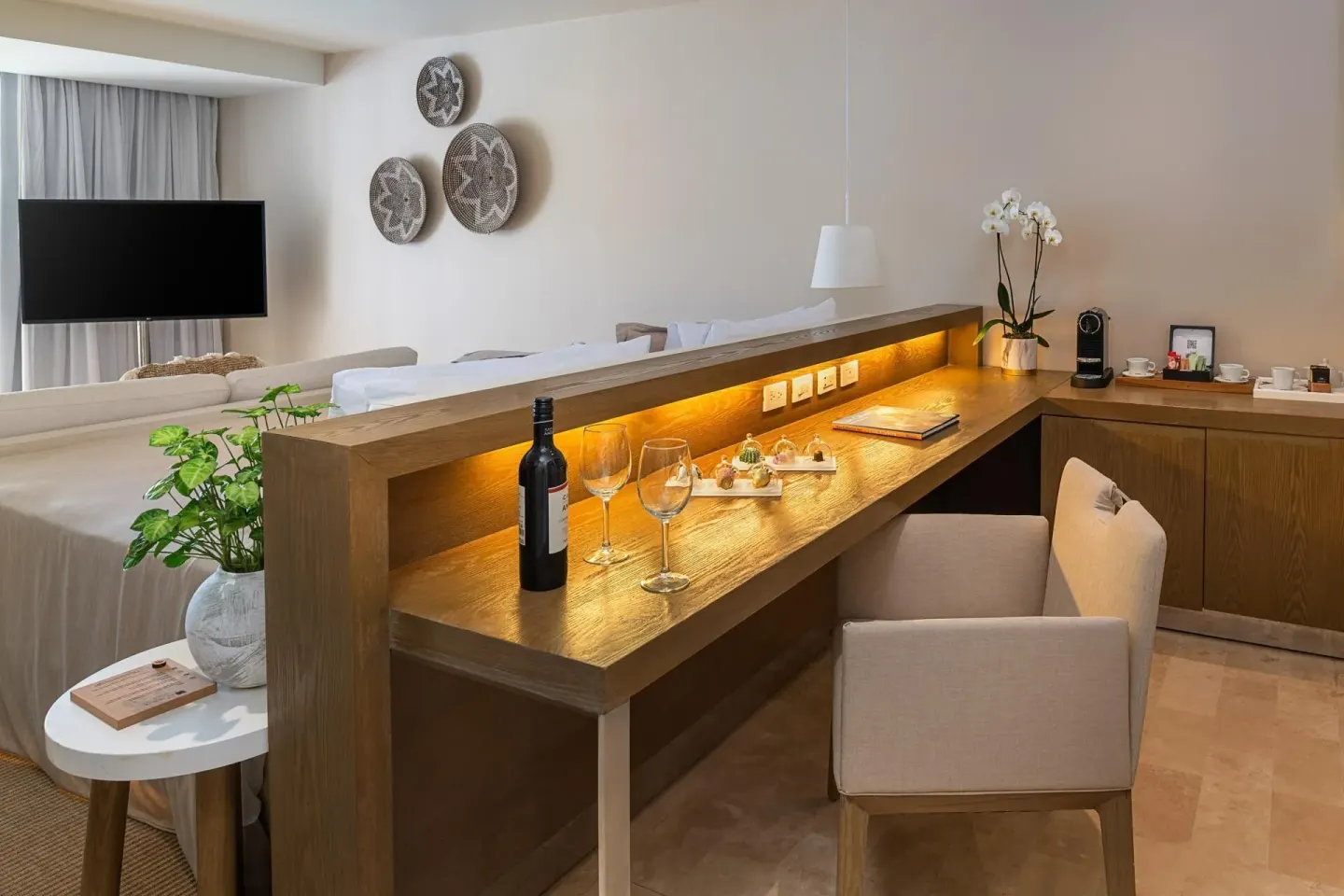 The Reserve Suite Swim-Up desk and minibar area at Paradisus Los Cabos.