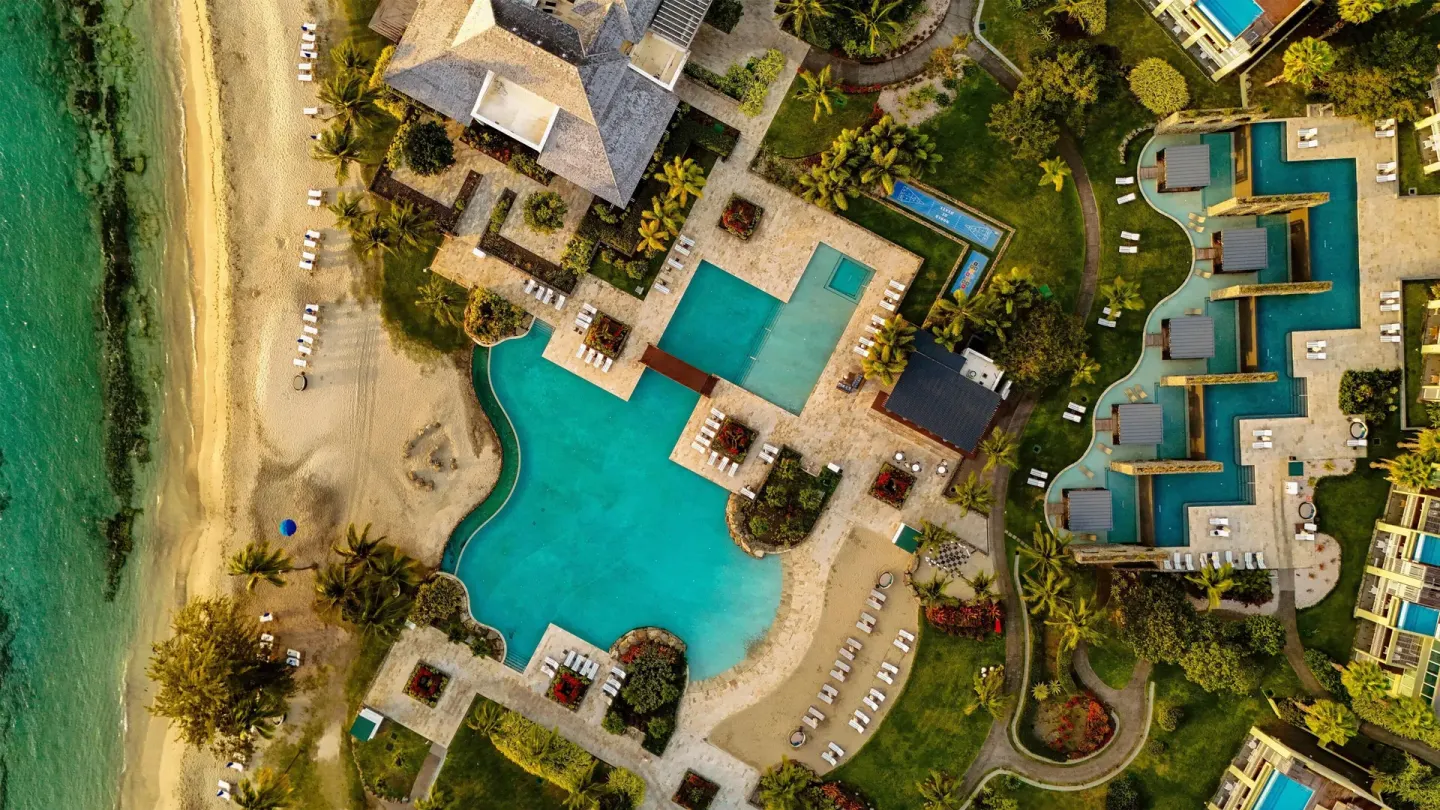 Aerial view of pools, beach, and gardens at Park Hyatt St. Kitts.