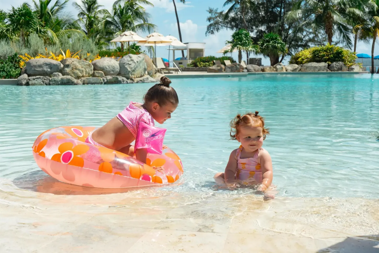Children play in the shallow resort pool at Park Hyatt St. Kitts.