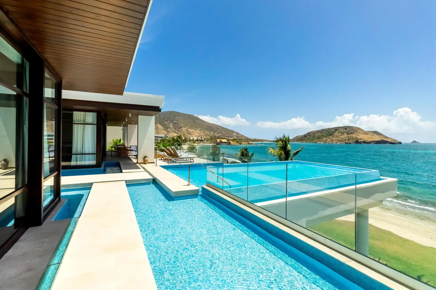 Oceanfront private pool terrace with loungers at Park Hyatt St. Kitts.