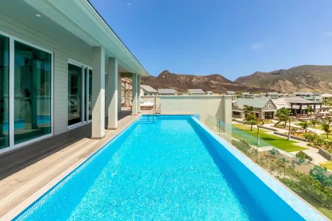 Private plunge pool with mountain and resort views at Park Hyatt St. Kitts.