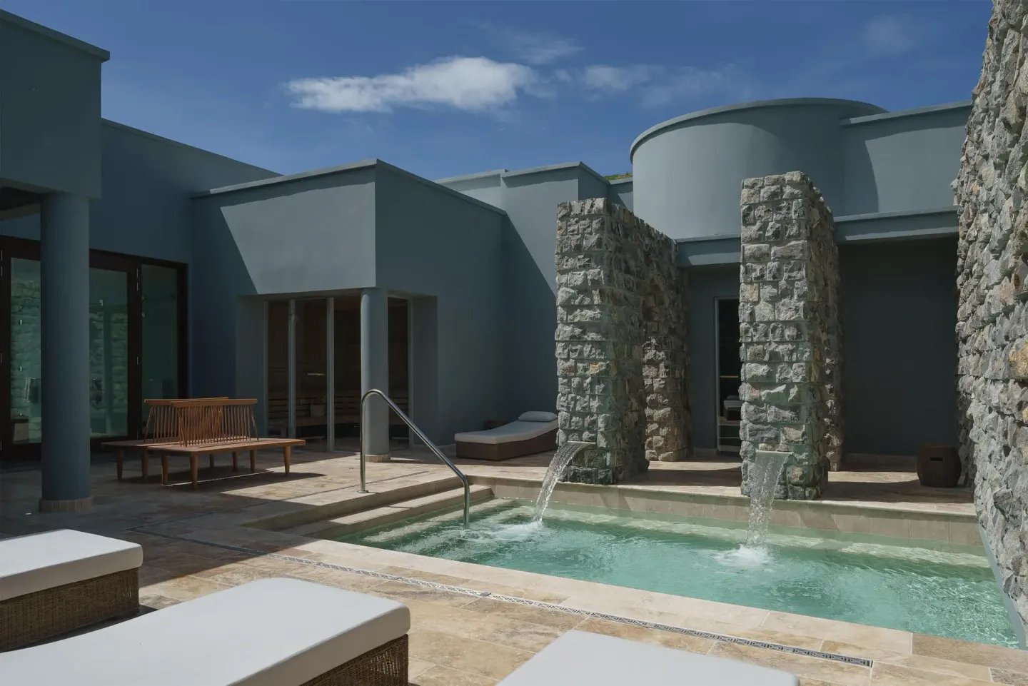 Spa courtyard pool with stone water features at Park Hyatt St. Kitts.