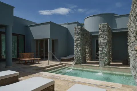 Spa courtyard pool with stone water features at Park Hyatt St. Kitts.