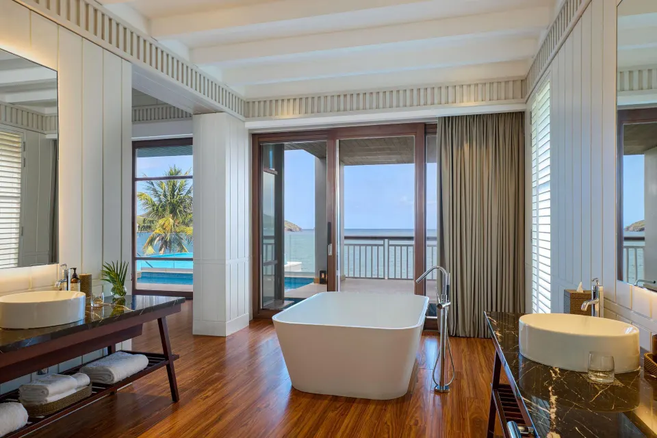 Presidential Villa bathroom with soaking tub and ocean view at Park Hyatt St. Kitts.