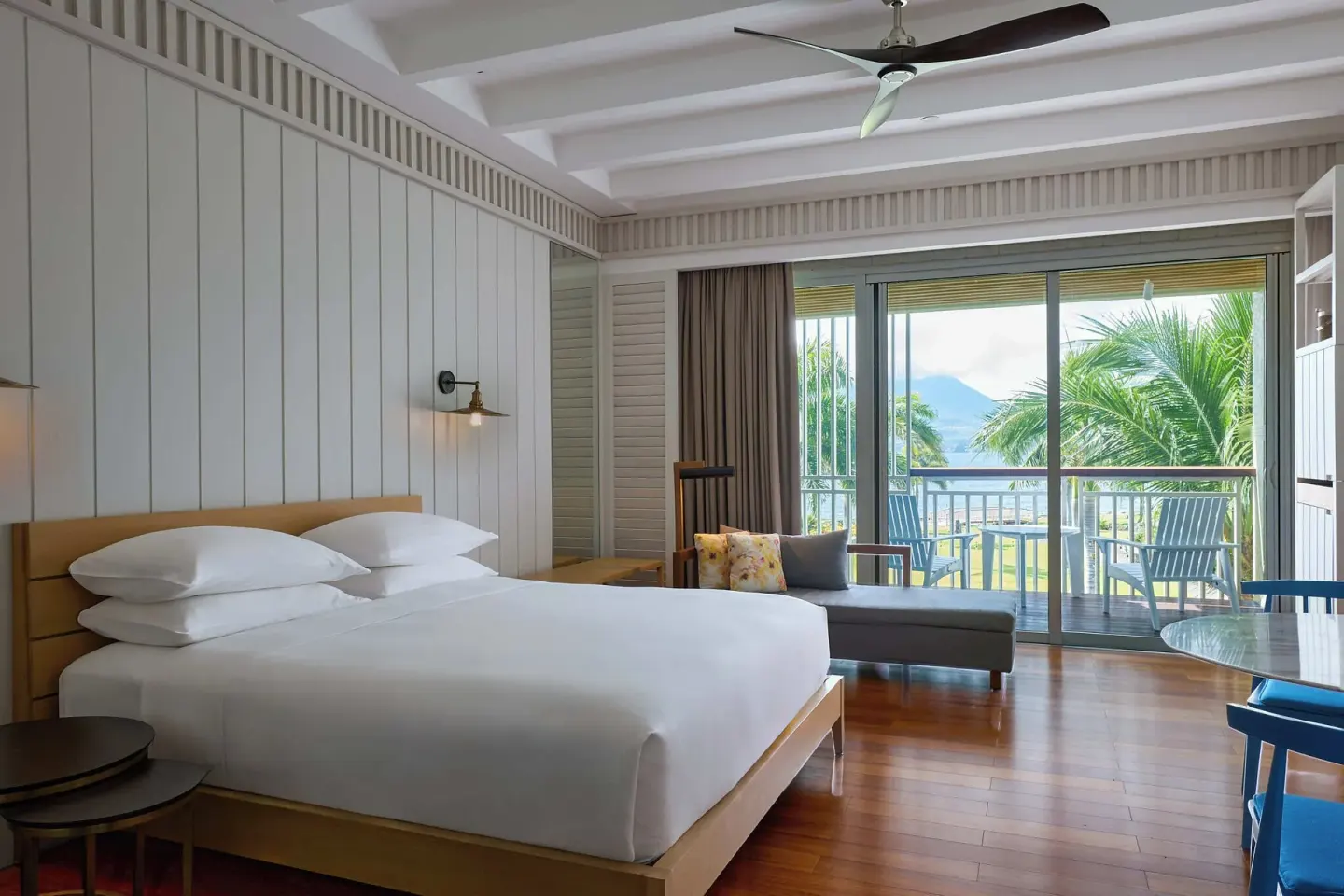 Accessible room with king bed and balcony seating at Park Hyatt St. Kitts.