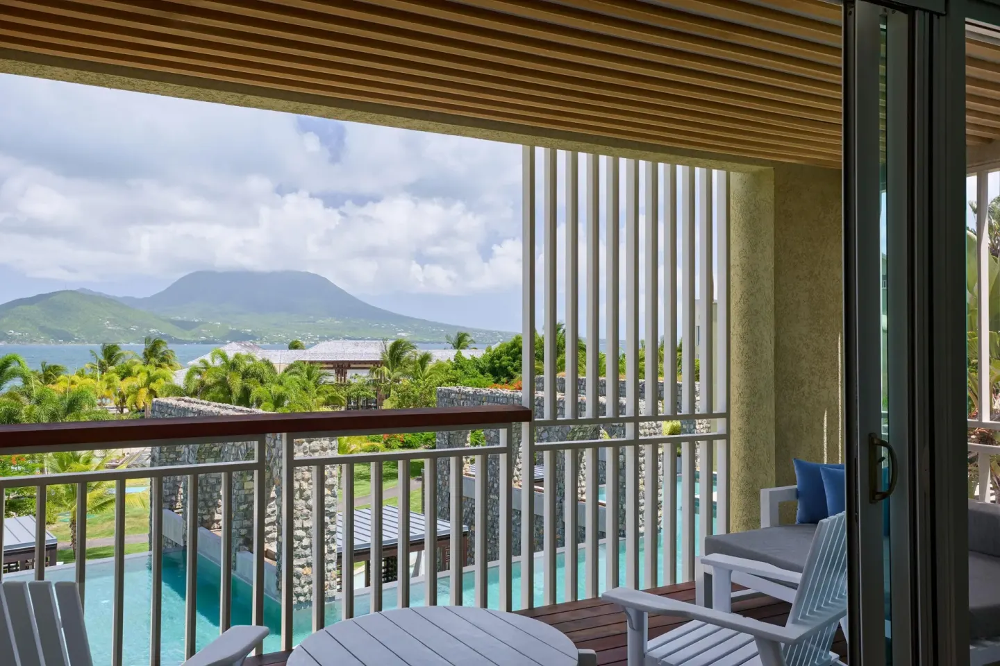 Pool View Room balcony seating and water view at Park Hyatt St. Kitts.