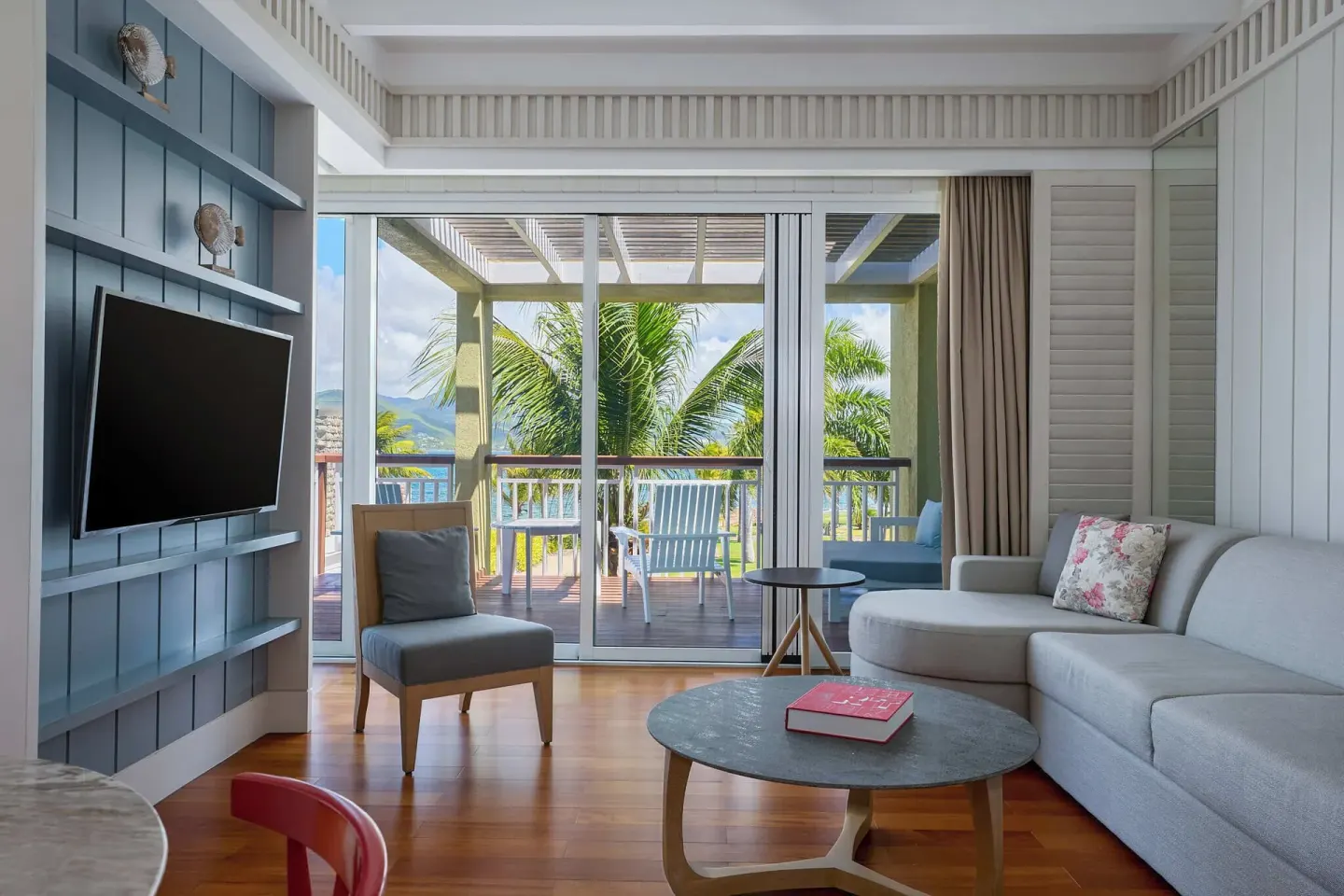 Accessible suite living room with balcony at Park Hyatt St. Kitts.