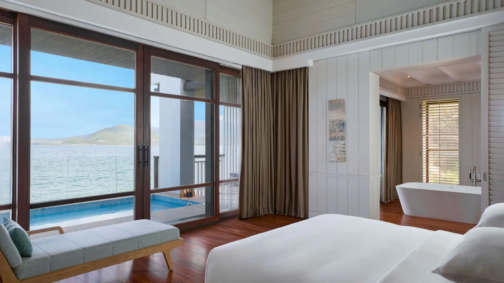 Two Room with king bed and terrace offering water view at Park Hyatt St. Kitts.