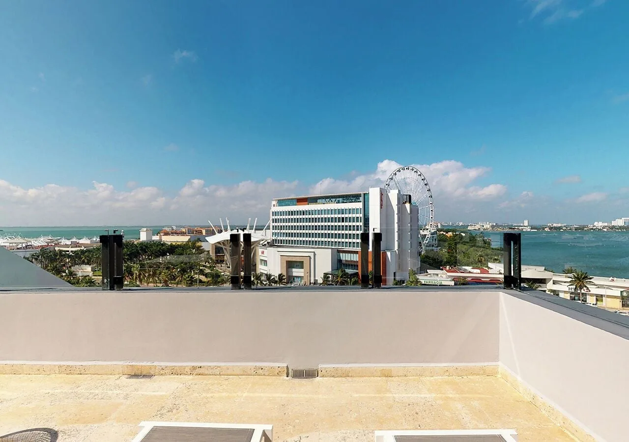 Terrace view toward Cancun lagoon and city skyline at Park Royal Beach Cancun.