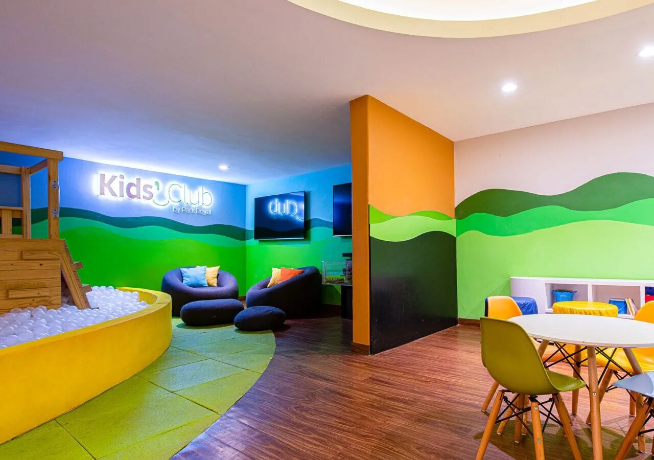 Kids' club play area with ball pit and small tables at Park Royal Beach Ixtapa.